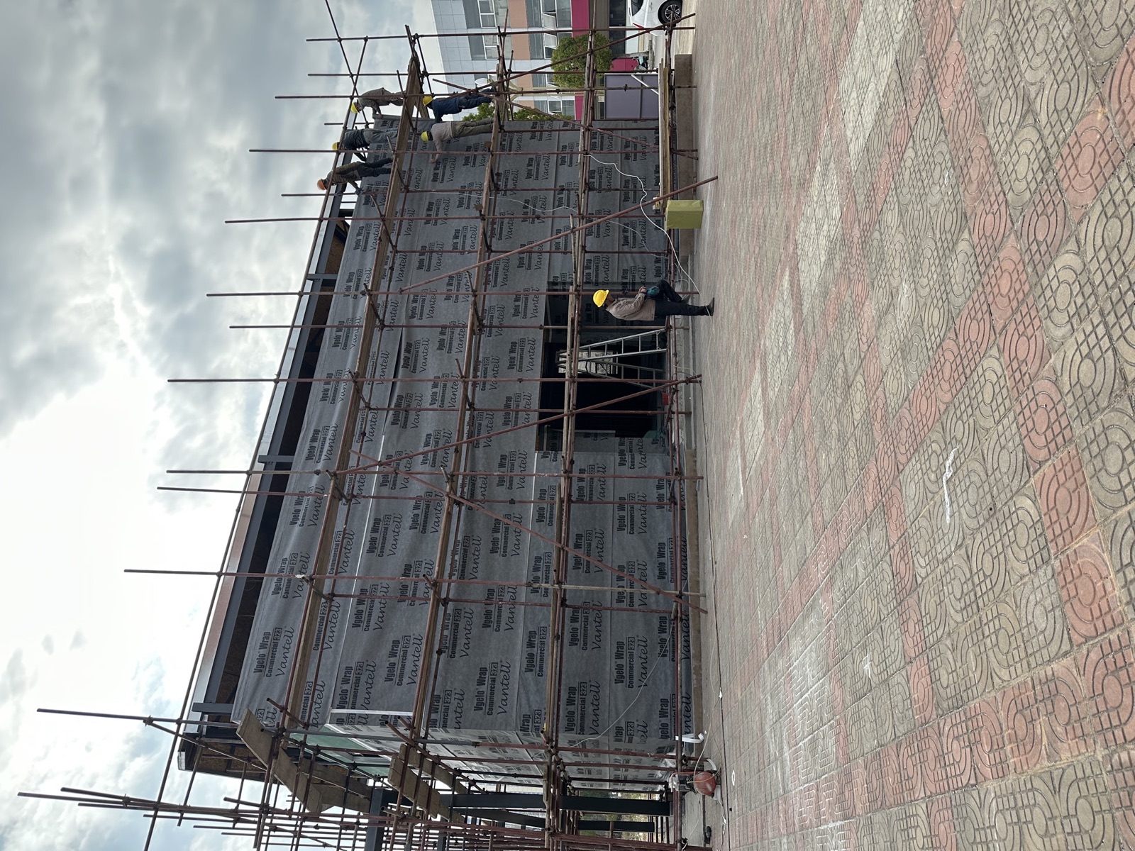 Qujing office wall surfaces fully wrapped with VWC323 weather-resistive barrier